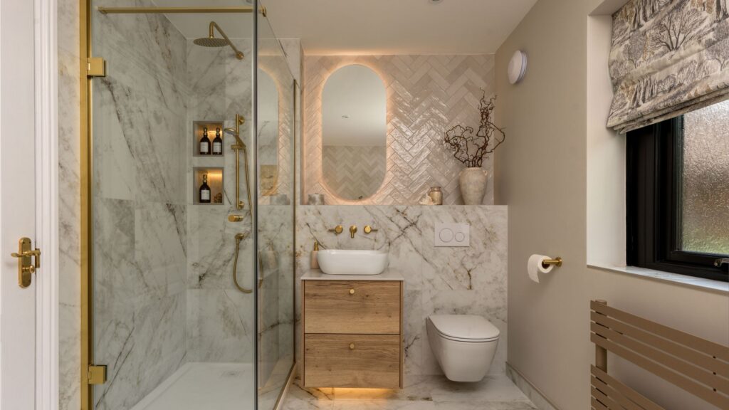 This quiet luxury bathroom is packed with clever lighting