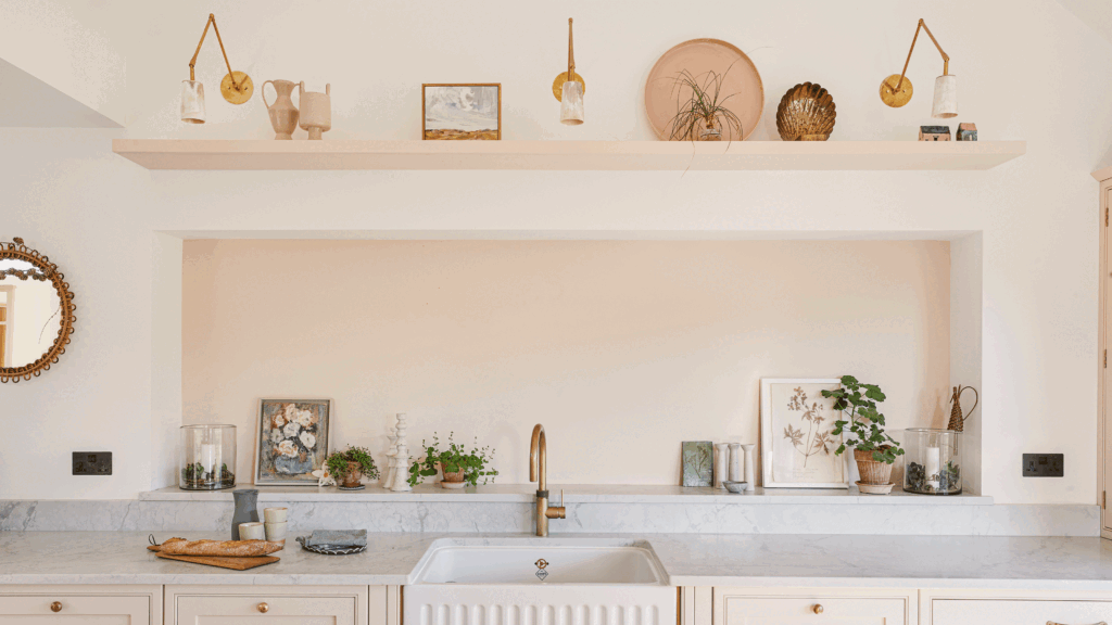 An outdated galley kitchen was jettisoned for a pink design