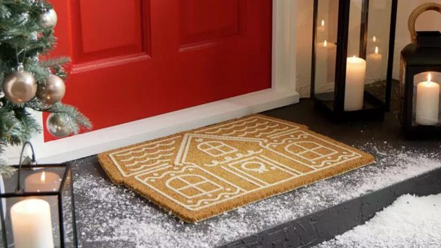 I’m seeing these gingerbread house doormats everywhere