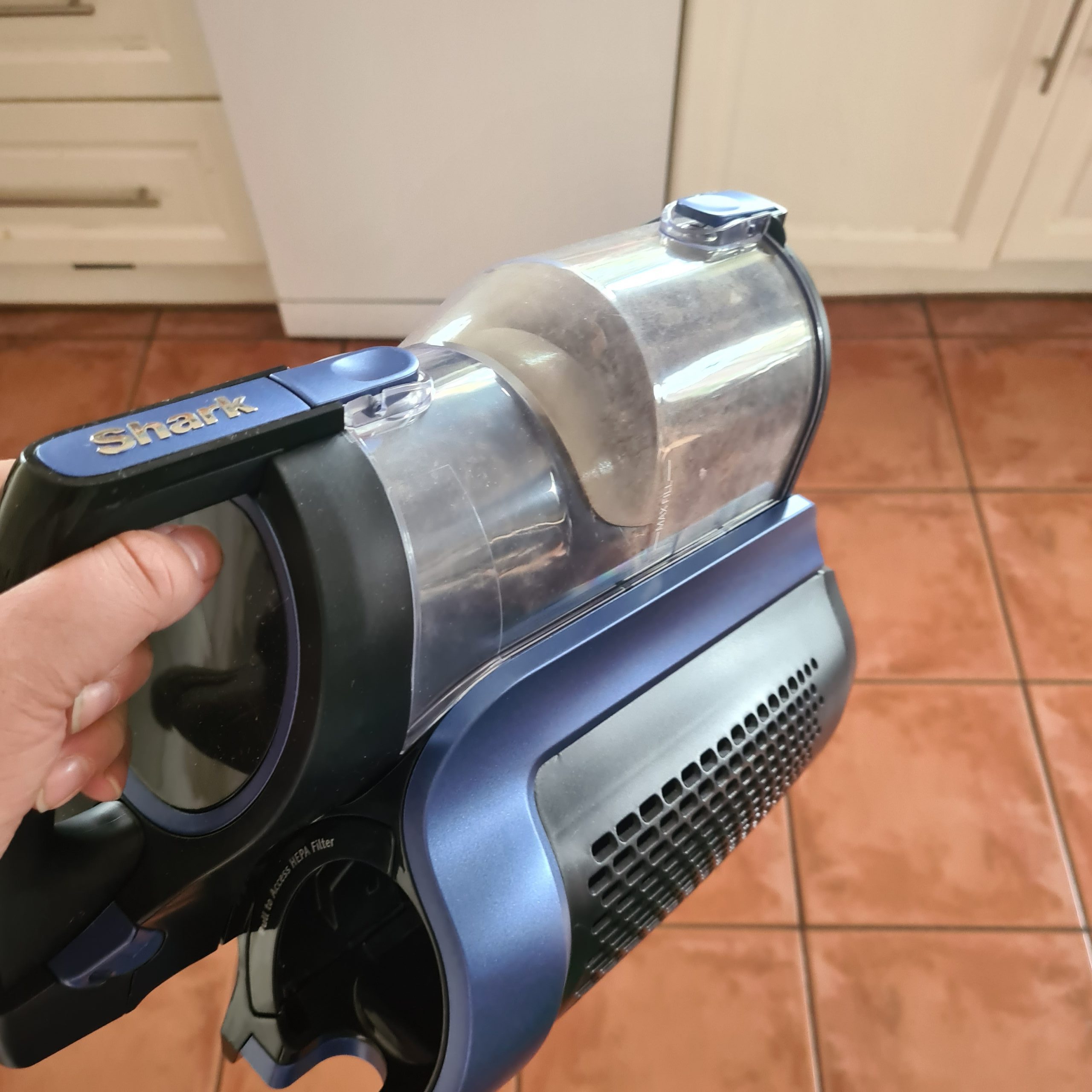 Shark ICZ300UKT Anti Hair Wrap Cordless Upright Vacuum Cleaner with a tiled floor
