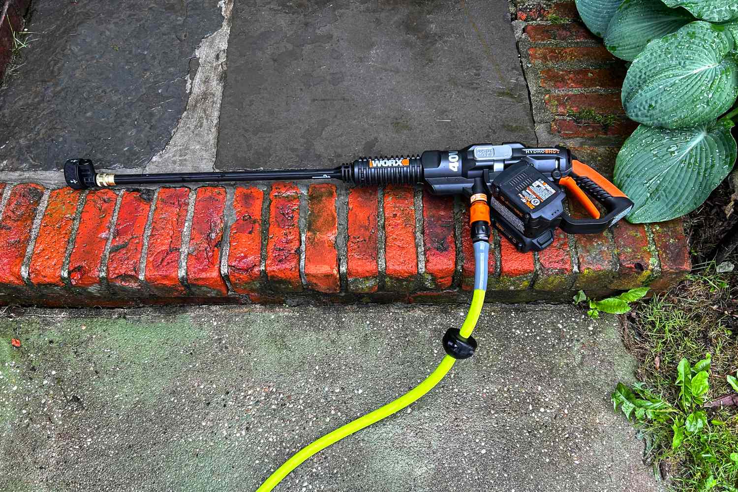 Bricks and concrete before cleaning with the WORX 40V Power Share Hydroshot Portable Power Cleaner