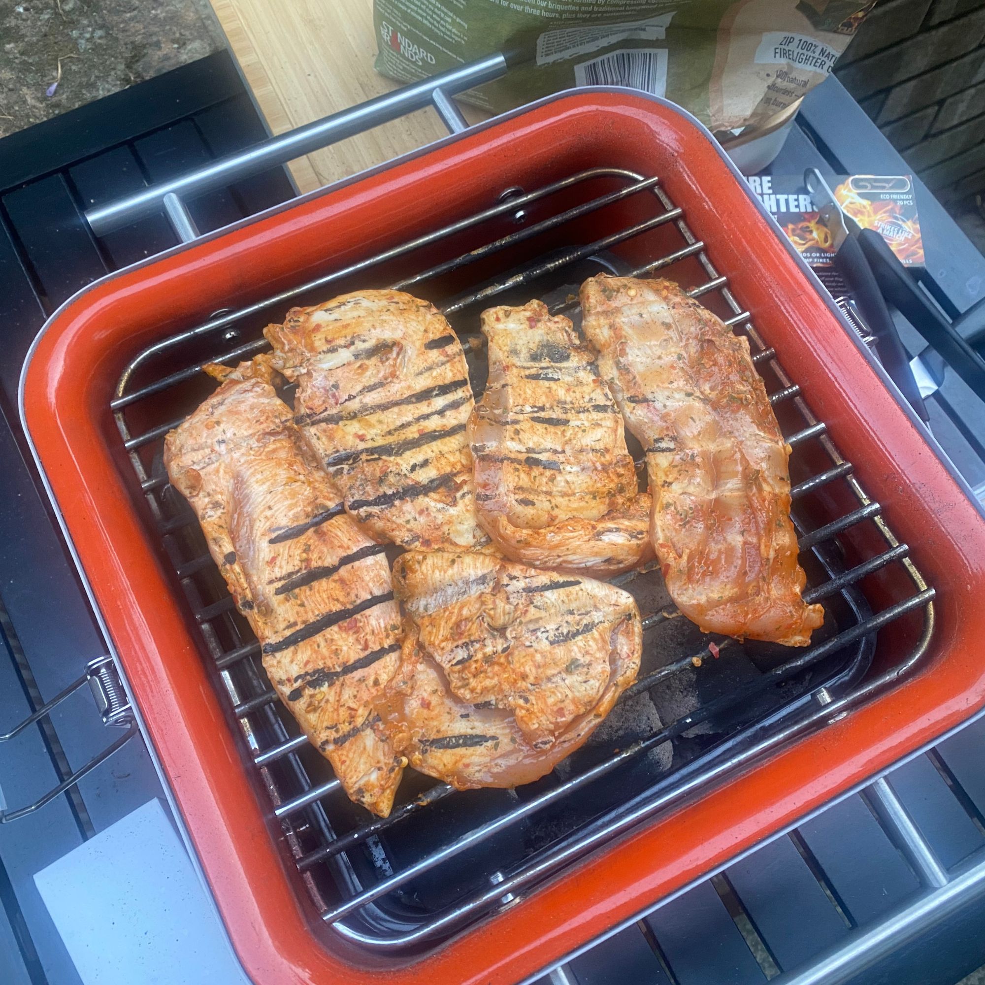 Everdure Cube BBQ cooking chicken