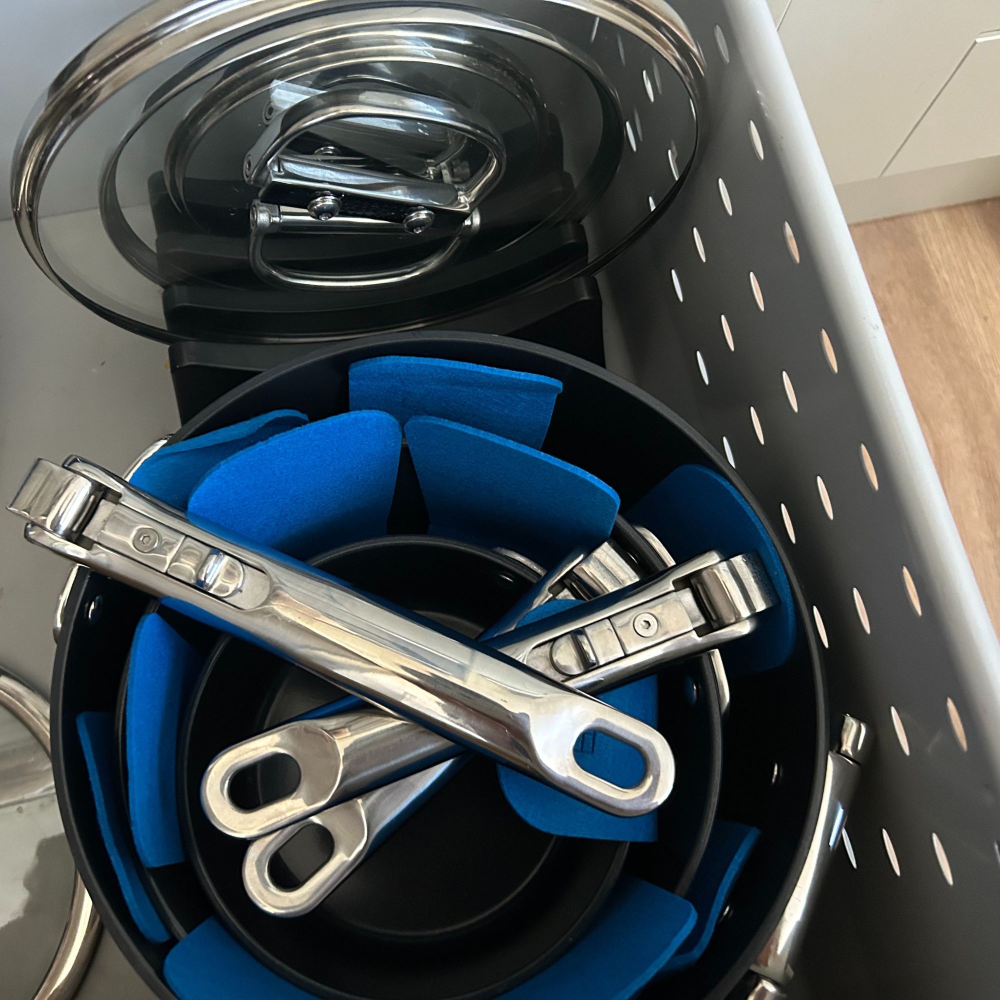 Joseph Joseph pans and lids set stored in kitchen drawer