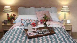 This striped Next ottoman bed nails every 2026 bedroom trend