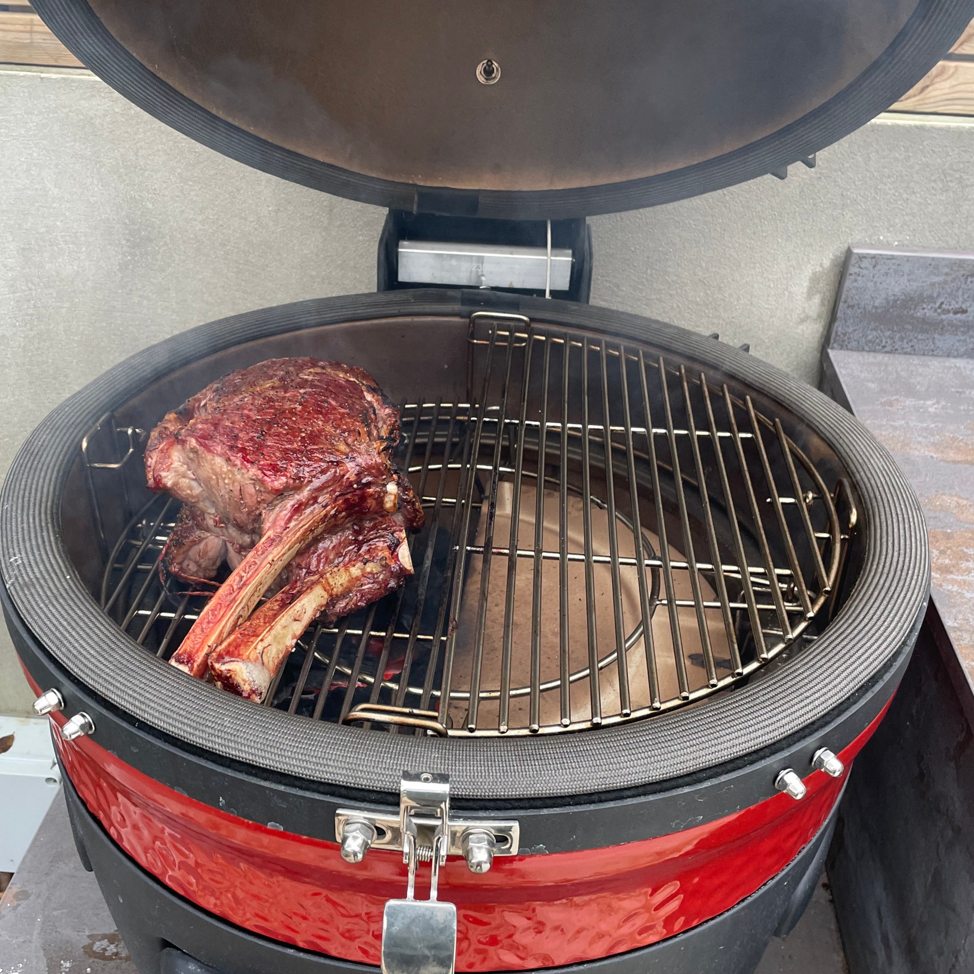 grilling steak on a kamado joe konnected joe digital charcoal grill and smoker