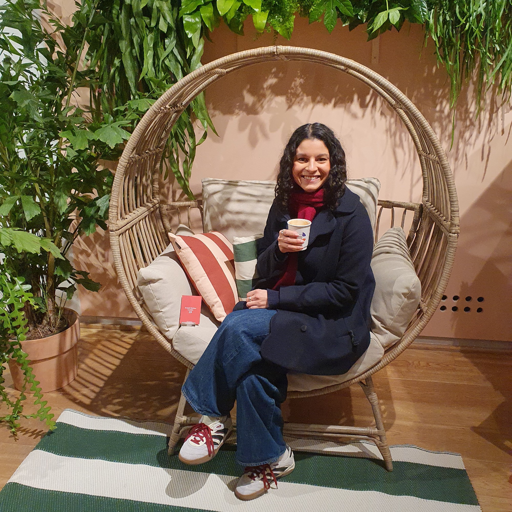 Sara sitting on the Selene garden egg chair by Habitat at the brand's press show for spring/summer 2025