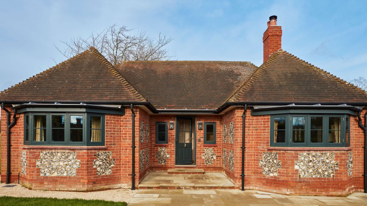 This charming cottage is a masterclass in zoning a small open-plan space